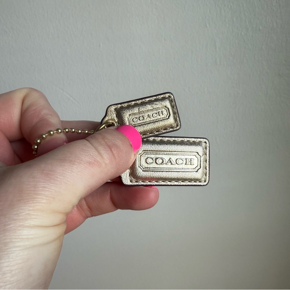 Coach set of two small bag tag luggage charms- gold metallic leather